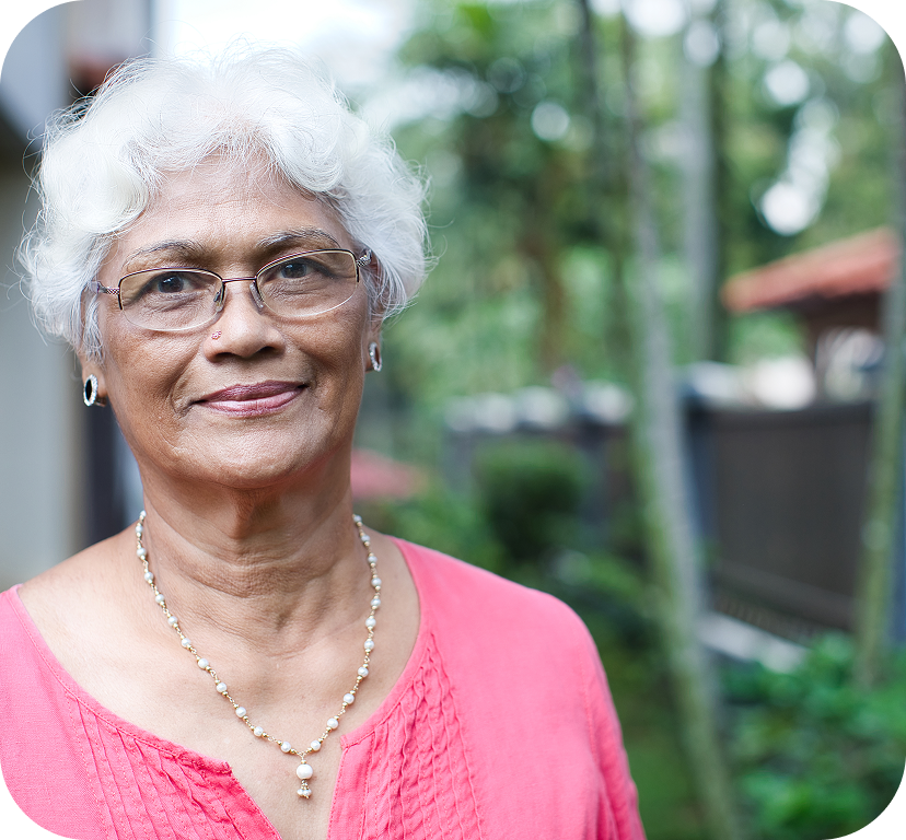 Photograph of Priya*, a 78-year-old woman.